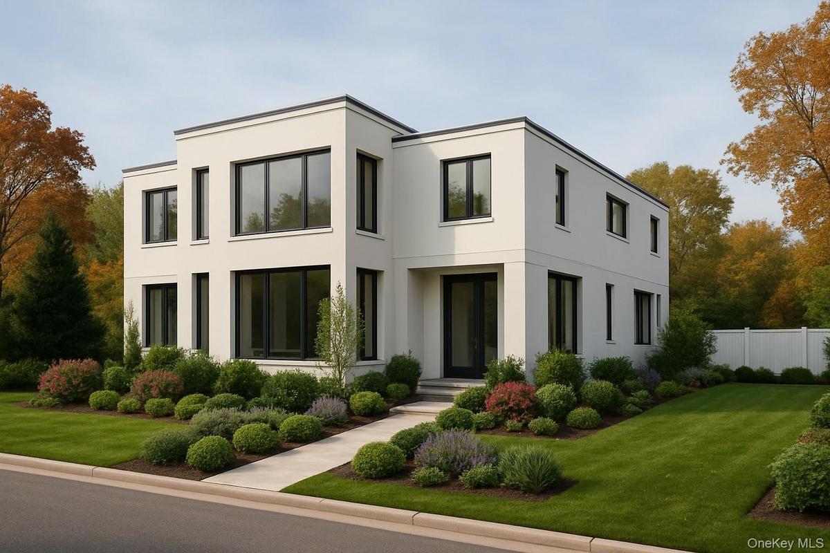 Contemporary house featuring stucco siding