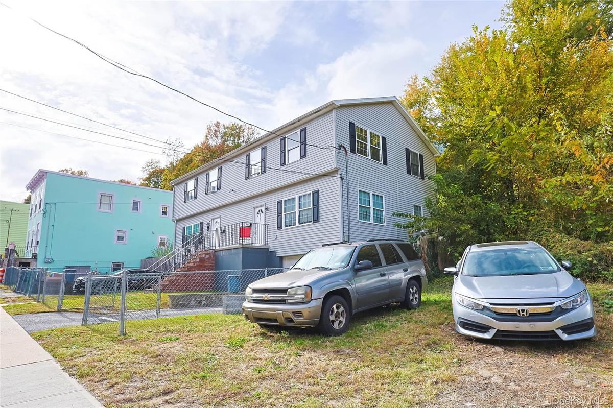Colonial-style house with a garage