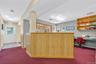 Reception area featuring built in desk