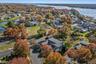 Aerial view of residential area with a large body of water
