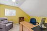 Office featuring lofted ceiling and light colored carpet