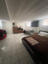 Bedroom featuring light tile patterned flooring
