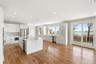 Kitchen with breakfast eat-in area and deck access