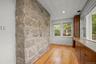 Empty room featuring baseboards and light wood-style floors