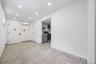Entrance foyer featuring recessed lighting and an AC wall unit