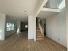 Stairs featuring wood finished floors