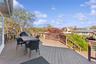 Wooden deck featuring outdoor dining area