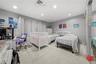 Carpeted bedroom featuring a textured ceiling and recessed lighting