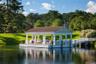 Dock featuring a water view and a yard