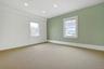 Empty Office featuring light colored carpet, recessed lighting, and crown molding