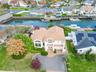 Aerial view of residential area with a nearby body of water