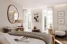 master bedroom with bespoke fitted joinery and arched window detail, off-plan apartment W6