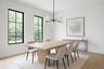 Dining room featuring a chandelier and light wood finished floors