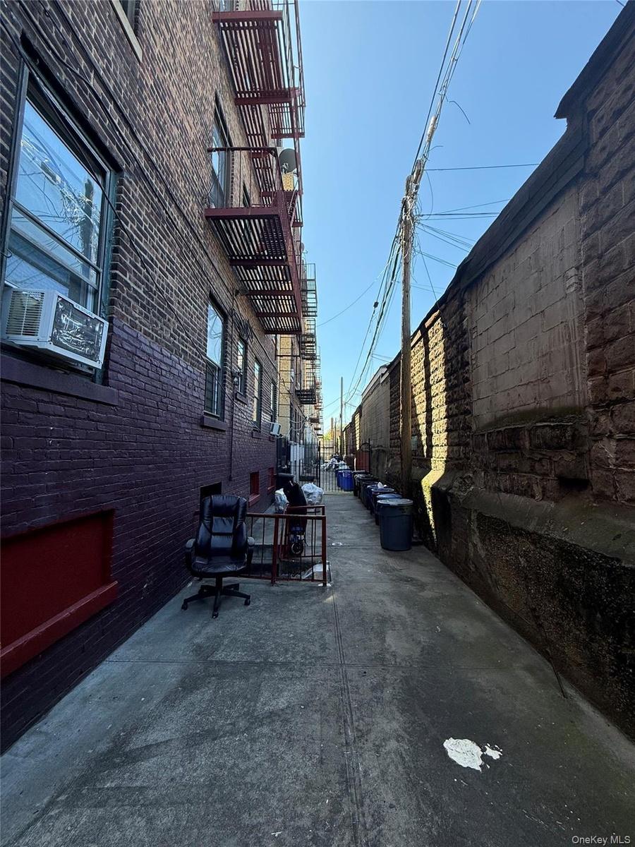 View of concrete alley