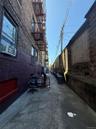 View of concrete alley