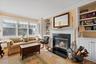 Primary Suite Den with Built-in Bookcases, and Fireplace