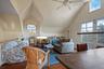 Guest Apt. Great Room featuring lofted ceiling, plenty of natural light, and french doors