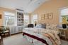 Primary Suite with Vaulted Ceilings and Built-in Bookcase