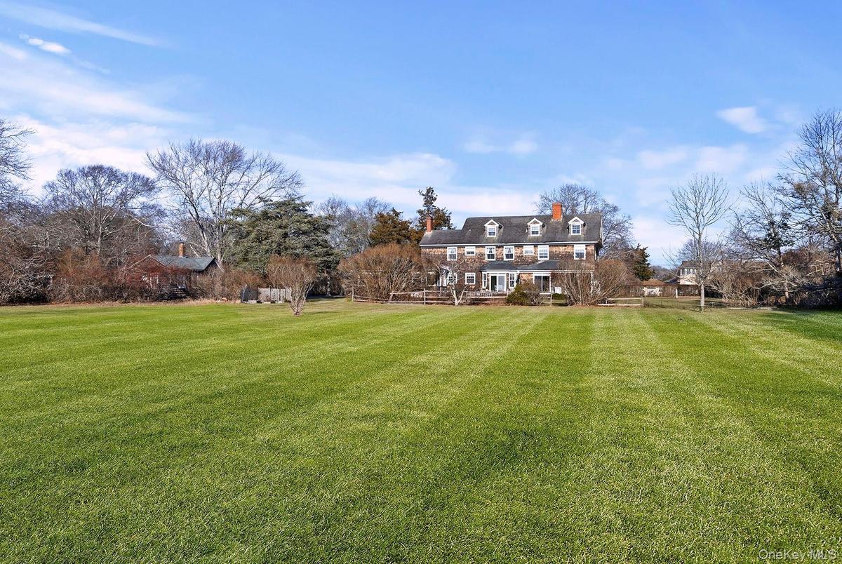 Expansive Lawn with room for pool and tennis court