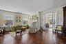 Back-to-Back Living Rooms with Fireplaces and hardwood floors