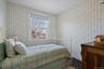 Bedroom with hardwood flooring