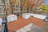 Fenced backyard featuring a storage shed