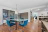Dining space featuring light wood-type flooring, recessed lighting, and a chandelier