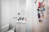 Full bath with a shower stall and vanity