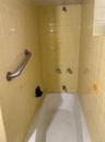 Bathroom featuring  shower combination