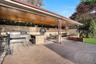 View of patio / terrace featuring exterior kitchen and outdoor dining space