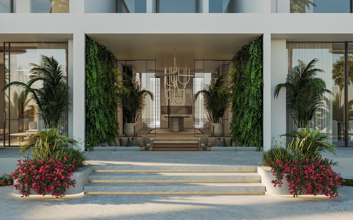 Double-height entrance foyer with designer chandelier, Hermès-inspired mansion Dubai