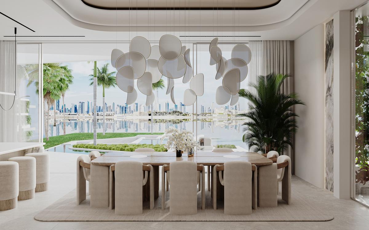 	Formal dining room with sculptural chandelier overlooking Arabian Gulf, Amali Island