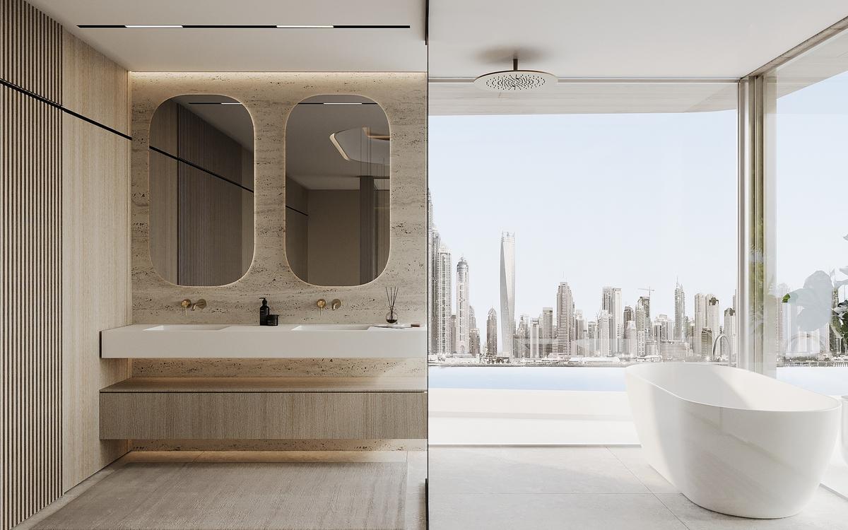 	Travertine master bathroom with freestanding bath and Dubai skyline view