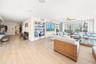 2 way mirror in the living room allows the views to carry through to the kitchen