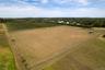 View of rural area featuring large plots for crops