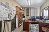 Home office with concrete flooring
