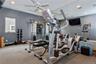 Gym featuring ceiling fan