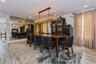 Dining space with a fireplace and light hardwood / wood-style floors