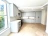 LIVINGROOM OPENS TO SPACIOUS TERRACE