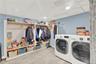Laundry room featuring washer and clothes dryer