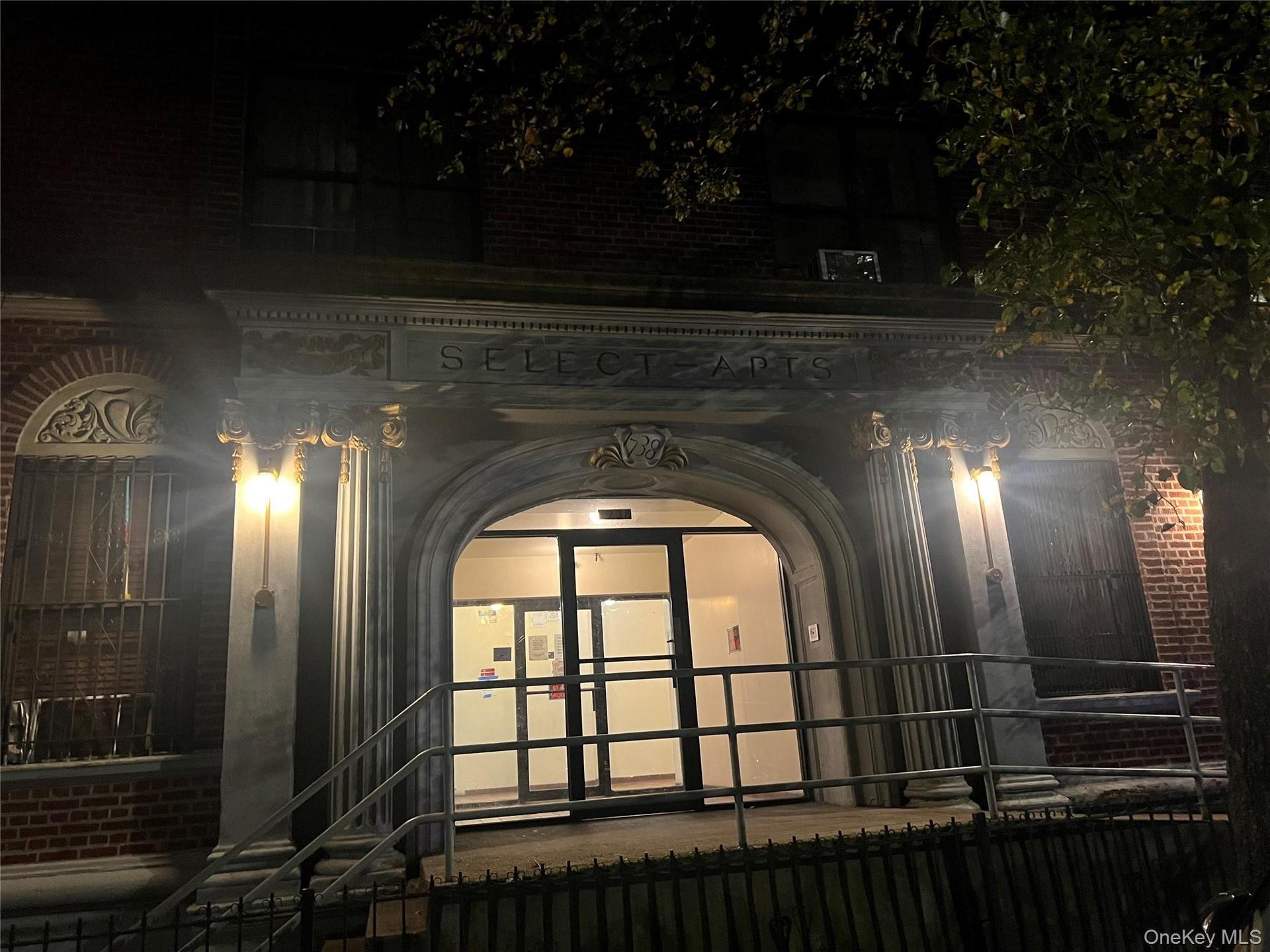 Detailed view of brick siding and arched walkways