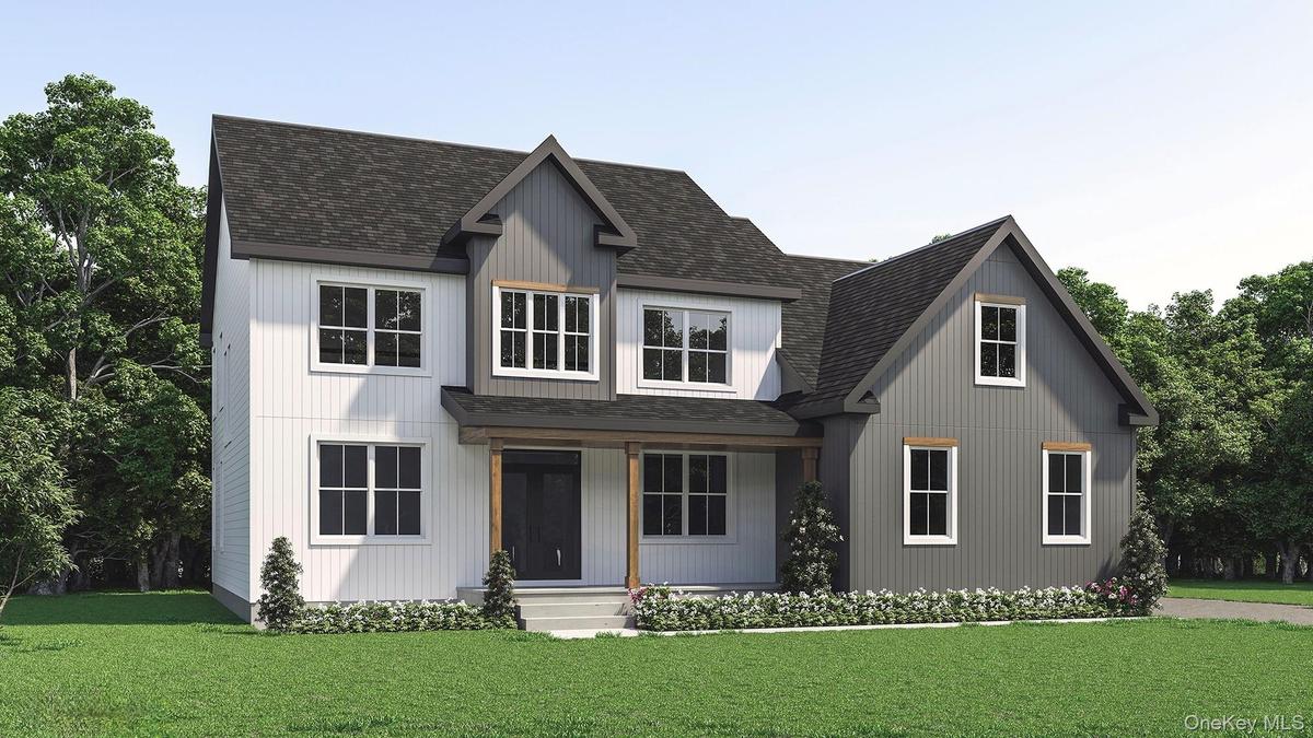 Modern farmhouse with a shingled roof, a front yard, and a porch