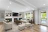 Great Rm Open Staged Concept living with a large fireplace, crown molding, light wood-type flooring, and recessed lighting