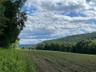 Property view of mountains with a rural view