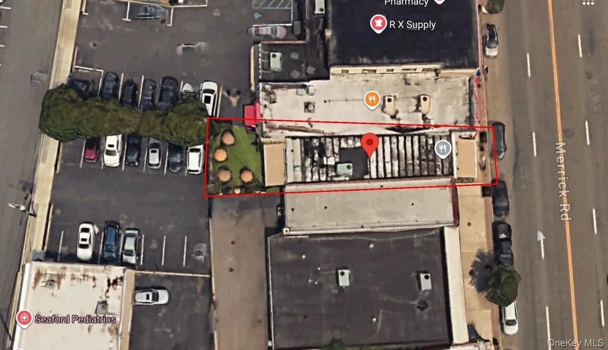 Aerial overview of property's location with property parcel outlined