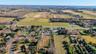 Aerial view of property's location featuring large plots for crops and rural landscape