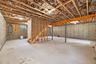 Basement featuring electric panel