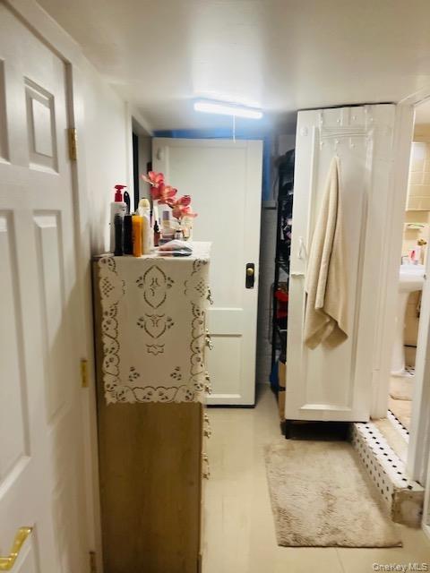Bathroom featuring light tile patterned flooring