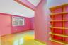 Bonus room with light wood-style floors and lofted ceiling