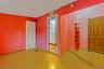 Unfurnished bedroom featuring light wood finished floors and a spacious closet